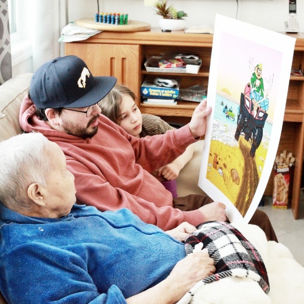 Nooks showing winning artwork to family