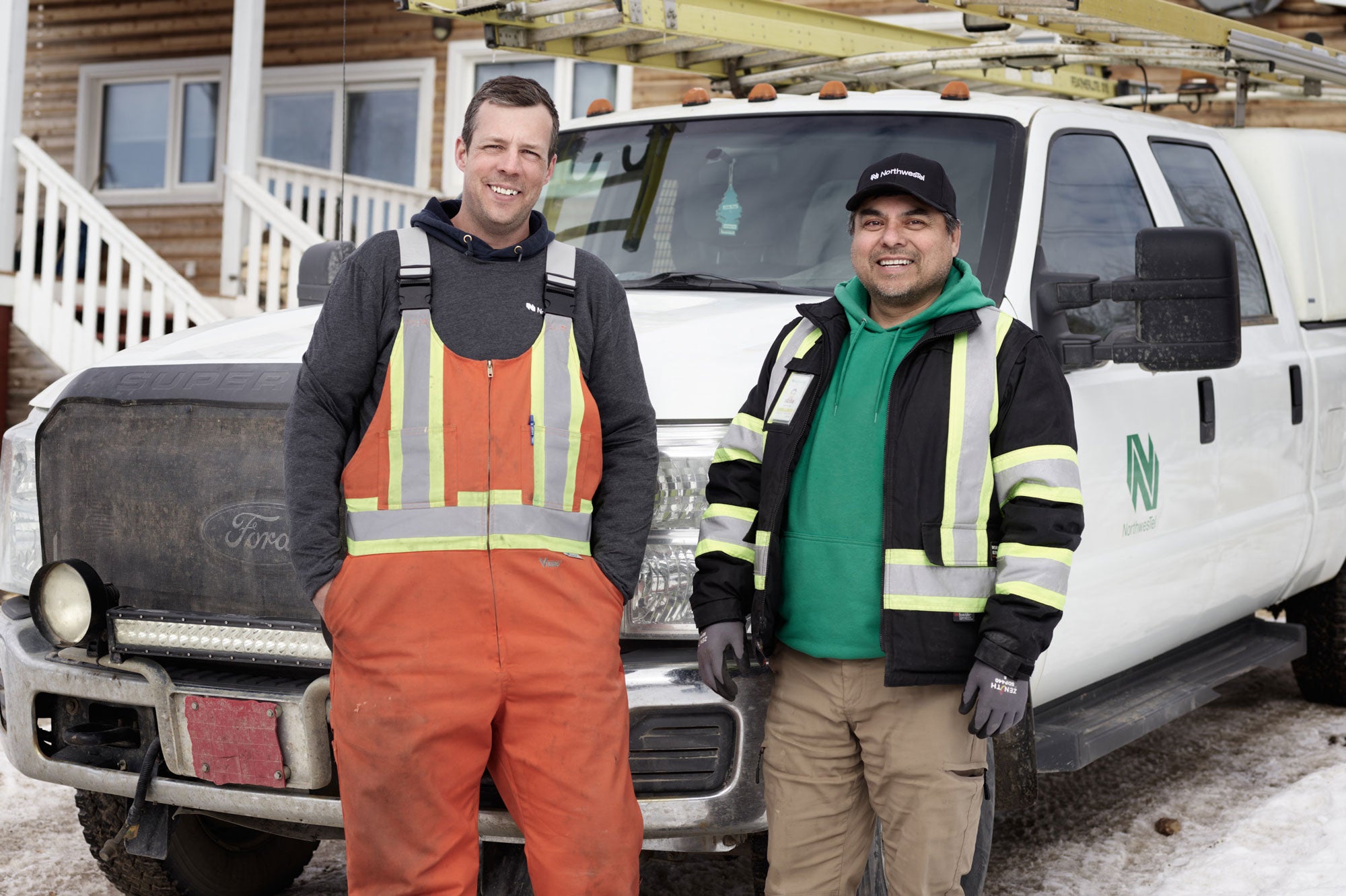 A photo of two Northwestel technicians.