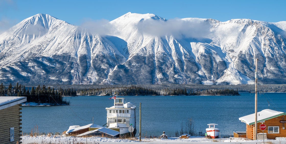 An old sternwheeler is seen along the waterfront in Atlin, BC