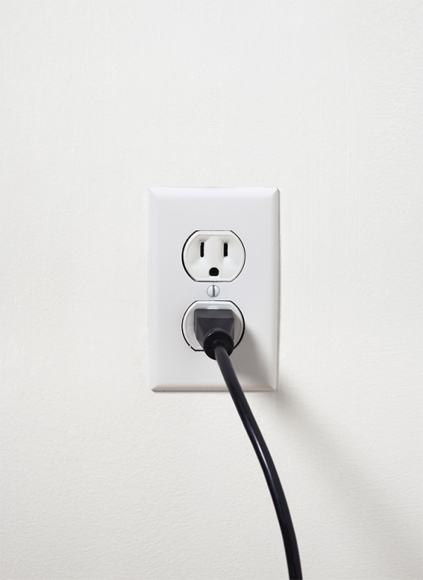Power cord to wall outlet