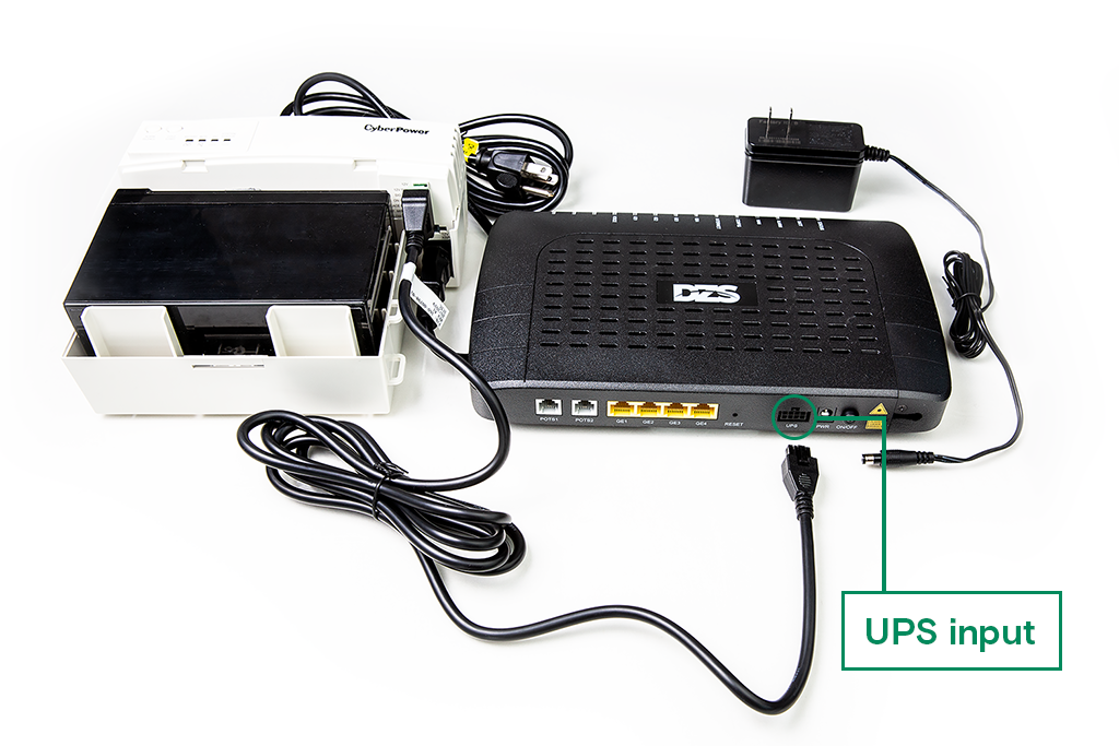 DC cable plugged in the UPS device and modem