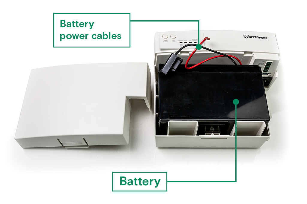 Opened UPS device with positive and negative wires and battery