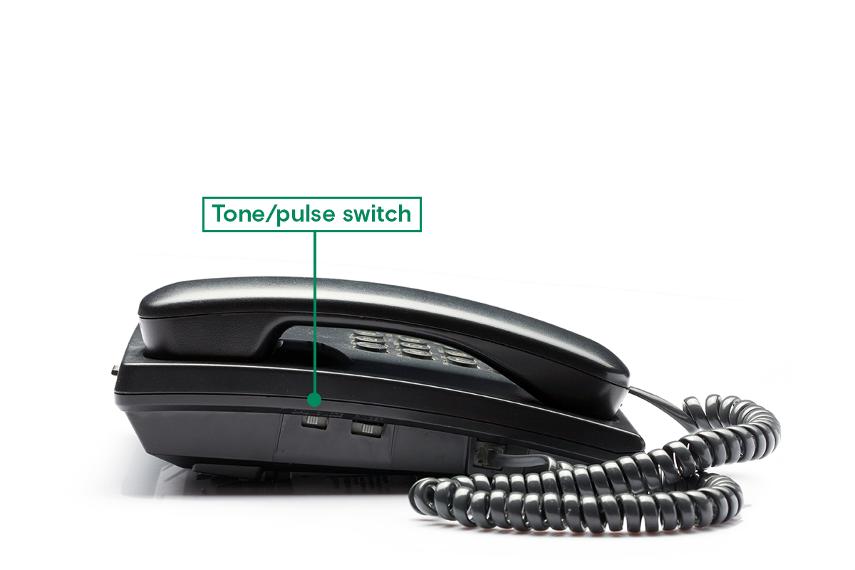 Side view of landline phone with tone, pulse switch