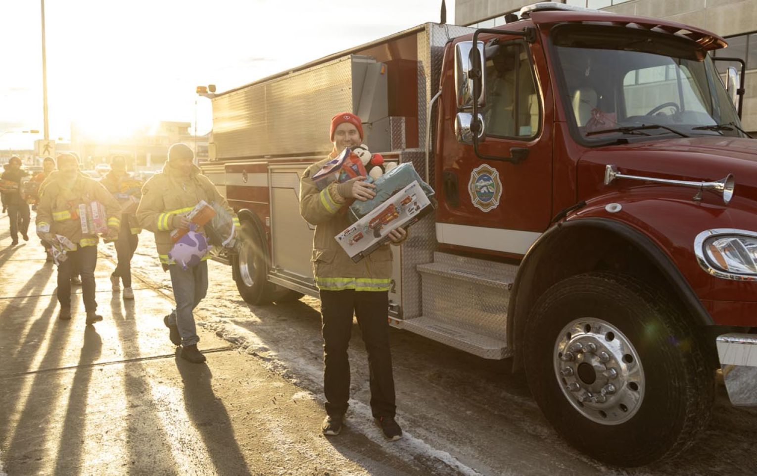 Nick standing in front of a fire truck