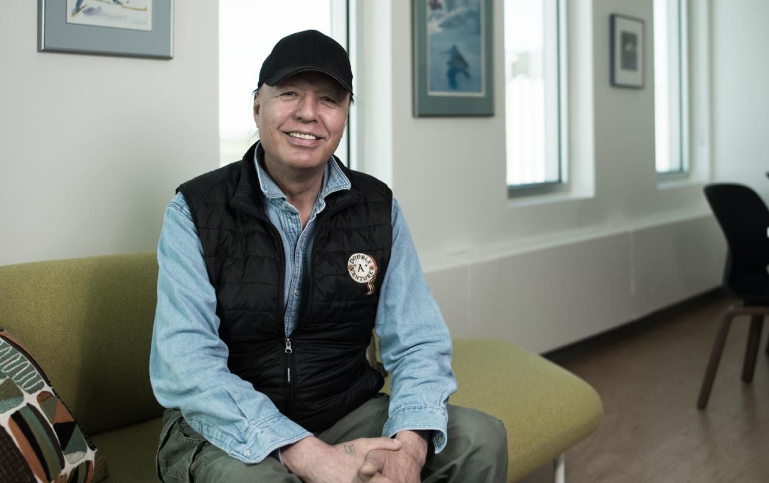 Don Antoine, from Northwestel's Government Relations Team sitting in office 